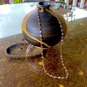 Touchstone Crystal rose gold mini chanelle necklace.